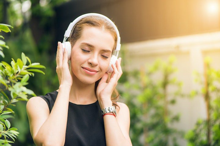 girl listening to music therapy